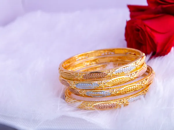 Gold_Metal_Stone_Embellished_Slim_Bangles_For_Women