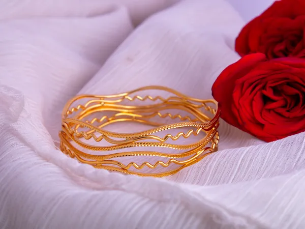 Gold_Metal_Wavy_Dotted_Patterned_Bangles_For_Women