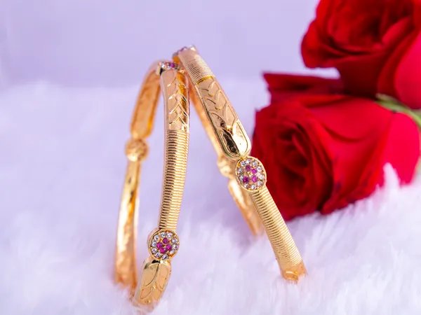 Gold_Metal_Leaf_Textured_Stone_Embellished_Bangles_For_Women