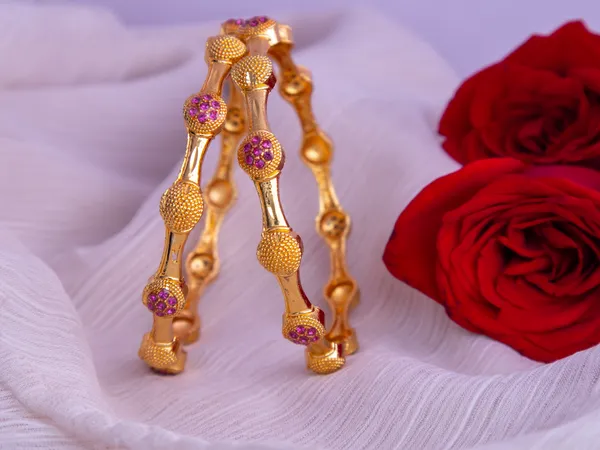 Gold_Metal_Purple_Stone_Studded_Round_Motif_Bangles_For_Women