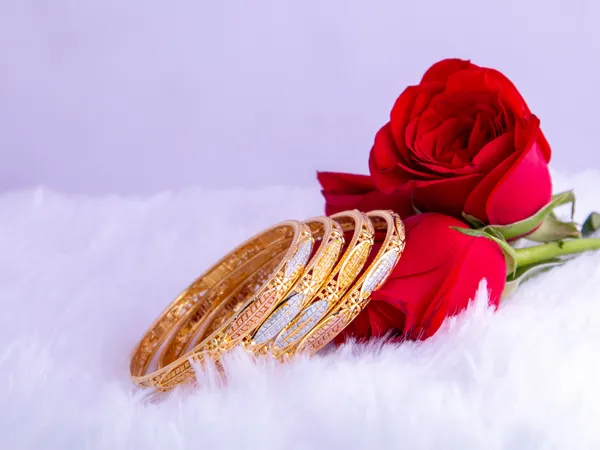 Gold_Metal_Stone_Embellished_Slim_Bangles_For_Women
