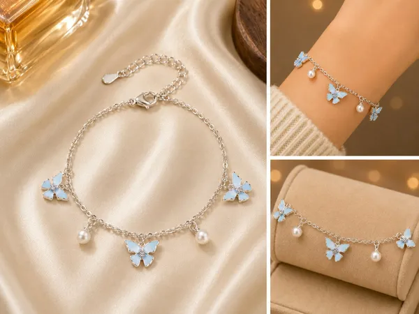 Elegant_Silver_Tone_Butterfly_Charm_Bracelet_For_Women_With_Blue_Enamel_Butterfly_Charms_Pearl_Dangle_Accents_And_Delicate_Chain_Design_Adjustable_Fashion_Jewellery_For_Party_Casual_Festive_And_Everyday_Wear