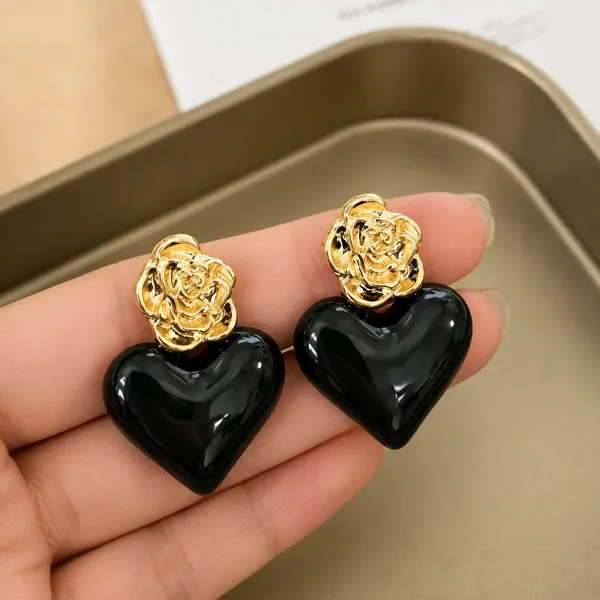 Elegant_Black_Heart_Drop_Earrings_For_Women_Glossy_Heart_Shaped_Design_With_Detailed_Golden_Rose_Studs_Bold_Trendy_Fashion_Jewellery_For_Party_Date_Night_Festive_And_Special_Occasion_Wear