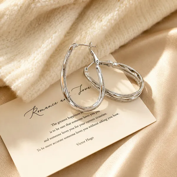 Elegant_Silver_Tone_Oval_Hoop_Earrings_For_Women_And_Girls_Double_Layered_Hoops_With_Delicate_Beaded_Edge_Detailing_Stylish_Minimalist_Statement_Earrings_For_Party_Wedding_Festive_Office_And_Everyday_Wear