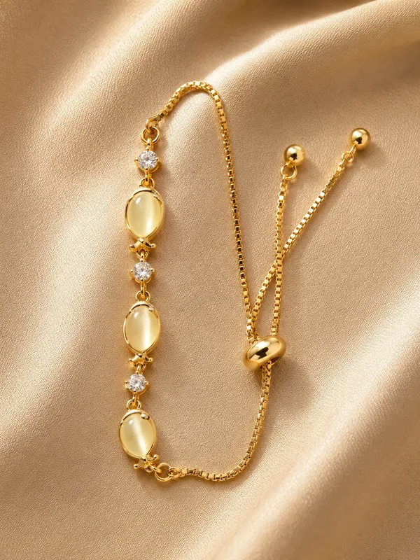 Elegant_Gold_Tone_Bracelet_For_Women_Oval_Pearl_Style_Stone_And_Sparkling_Crystal_Link_Design_With_Adjustable_Bolo_Chain_Chic_Minimalist_Fashion_Jewellery_For_Daily_Wear_Party_Wedding_And_Festive_Occasions