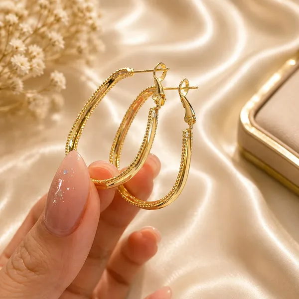 Elegant_Gold_Tone_Hoop_Earrings_For_Women_And_Girls_Long_Oval_Statement_Hoops_With_Delicate_Beaded_Edge_Detailing_Stylish_Minimalist_Dangle_Earrings_For_Party_Wedding_Festive_Office_And_Everyday_Fashion_Wear