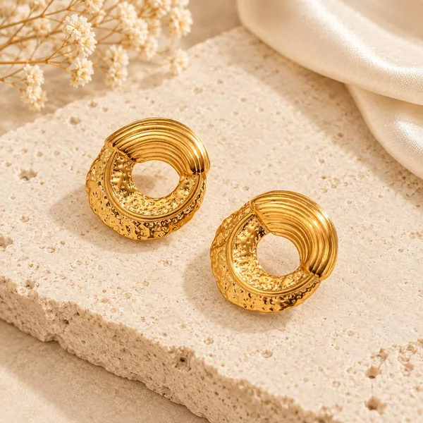Elegant_Gold_Tone_Textured_Open_Circle_Stud_Earrings_For_Women_Ribbed_Geometric_Statement_Jewellery_For_Party_Wedding_Festive_And_Everyday_Wear