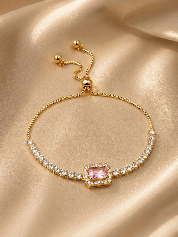 Elegant_Gold_Tone_Pink_Crystal_Tennis_Bracelet_For_Women_With_Adjustable_Bolo_Chain_Sparkling_Round_Cubic_Zirconia_Style_Stones_And_Central_Cushion_Cut_Pink_Gemstone_Stylish_Party_Wear_Fashion_Jewellery