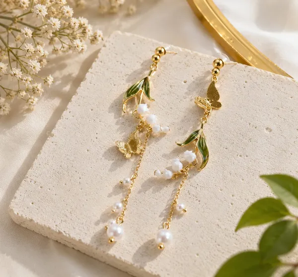Elegant_Green_Leaf_Butterfly_Pearl_Drop_Earrings_For_Women_Gold_Tone_Floral_Nature_Inspired_Statement_Jewellery_For_Party_Wedding_And_Festive_Wear