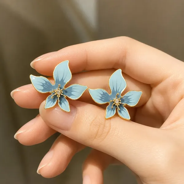 Elegant_Light_Blue_Floral_Stud_Earrings_For_Women_Beautiful_Enamel_Flower_Design_With_Sparkling_Center_Gold_Tone_Finish_Lightweight_Trendy_Fashion_Jewellery_For_Daily_Wear_Party_Wedding_And_Festive_Occasions