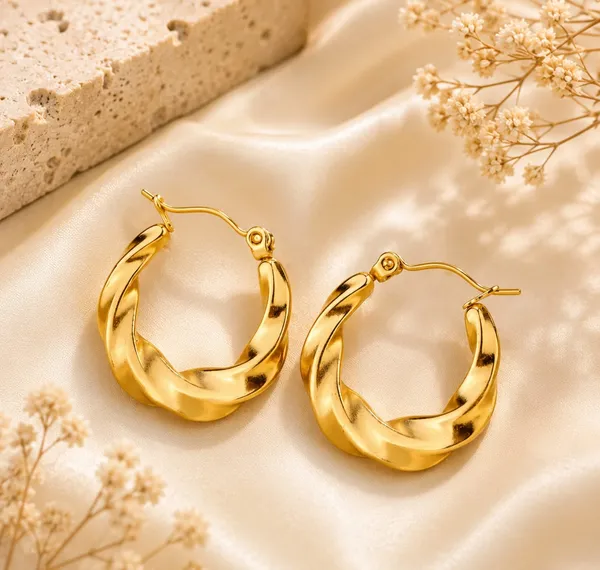 Elegant_Gold_Tone_Twisted_Hoop_Earrings_For_Women_Smooth_Chunky_Circular_Statement_Jewellery_For_Party_Wedding_Festive_Ethnic_And_Everyday_Wear