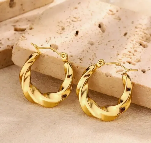 Elegant_Gold_Tone_Twisted_Hoop_Earrings_For_Women_Smooth_Chunky_Circular_Statement_Jewellery_For_Party_Wedding_Festive_Ethnic_And_Everyday_Wear