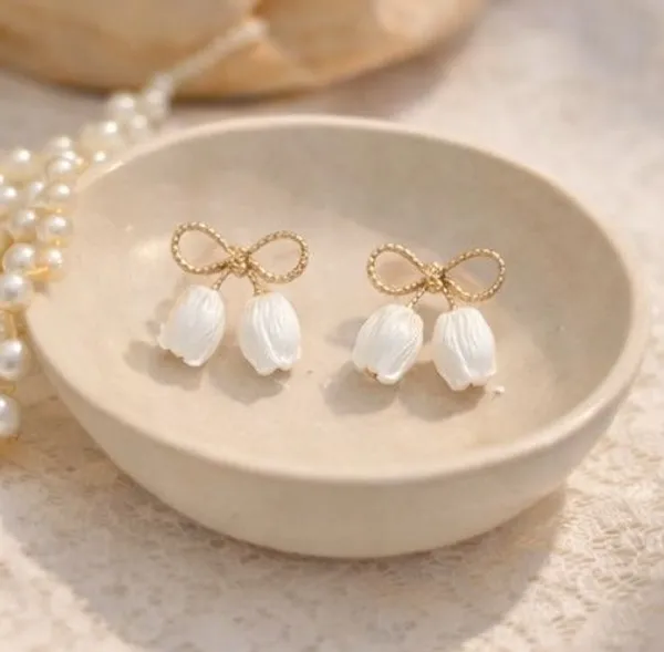 Gold_Bow_Stud_Earrings_With_Pearl_Petal_Charms_For_Women