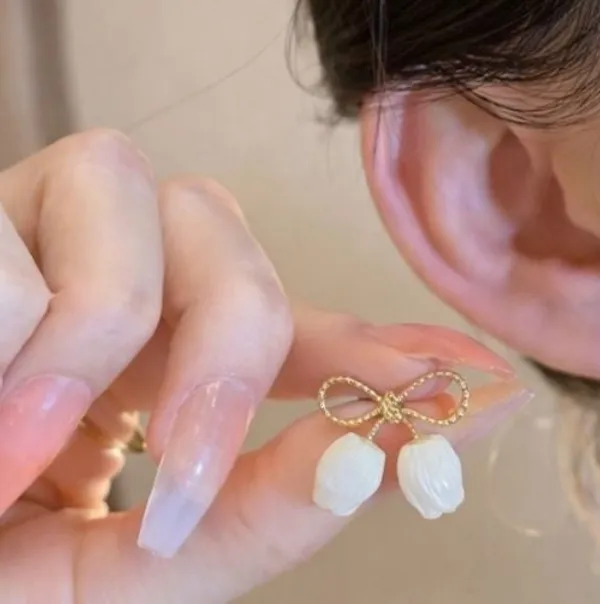 Gold_Bow_Stud_Earrings_With_Pearl_Petal_Charms_For_Women
