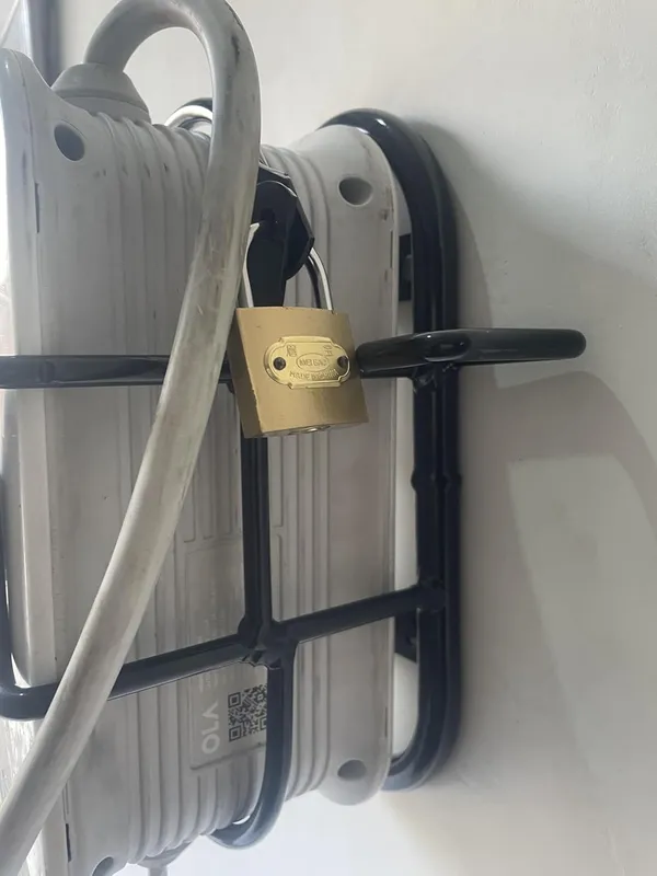Grandbiker_O.l.a_Gen_1_and_Gen_2_Wall_Mounted_Charger_Holder|_Rustproof_|_with_Free_Key_Lock_Protection_(S1_Pro_|_S1_Air/_S1_X_|_S1_X_Plus)_for_All_O.l.a_Electric_Scooters_(Charger_Holder-2)
