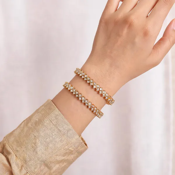 Gold_Plated_Metal_Criss_Cross_White_Stone_Bangles_For_Women