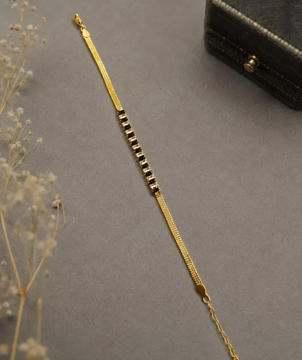Designer_American_Diamond_&_Black_Crystal_Gold-Plated_Bracelet_for_Girls_and_Women