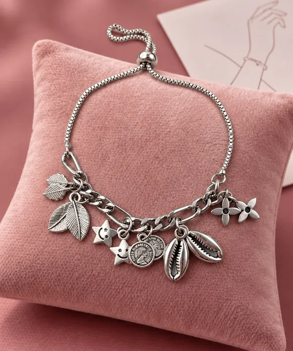 Elegant_Silver_Charm_Bracelet_–_Leaf_&_Floral_Collection