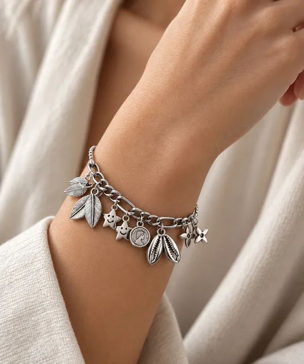 Elegant_Silver_Charm_Bracelet_–_Leaf_&_Floral_Collection