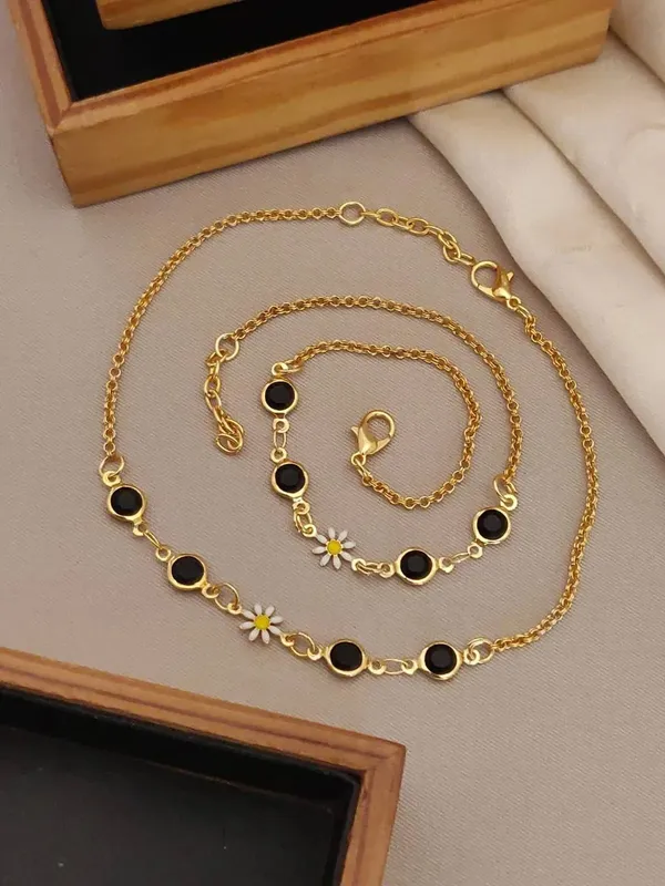 Gold_Brass_Floral_Black_Stone_Necklace_Bracelet_Earrings_Set_For_Women