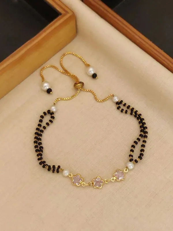 Gold_Brass_Alloy_Black_Bead_Floral_Pendant_Mangalsutra_For_Women