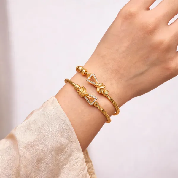 Gold_Brass_Alloy_Bow_Stone_Embellished_Bangles_For_Women