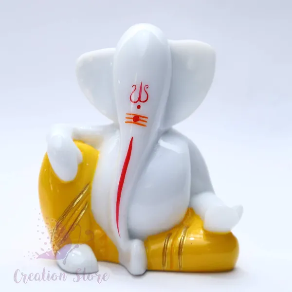 Tilak_Ganesh_Idol_For_Car_Dashboard_Small_Marble_Idol_God_Ganesha_Statue_Murti_Ganpati_Idol_Figurine_White_Yellow_35_X_30_Centimeters