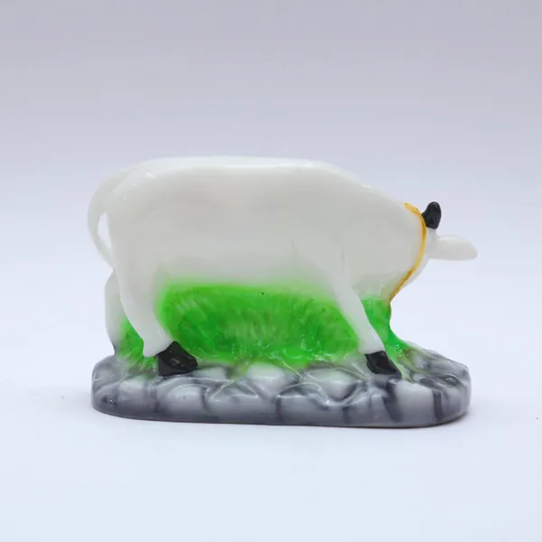 Hindu_Kamdhenu_Cow_And_Calf_Idol_Cultured_Marble_Stone_Handmade_Cow_And_Calf_Murti_For_House_Office_Shop_For_Spiritual_Vastu_Nandi_Pooja_5_Inch_Multicolor