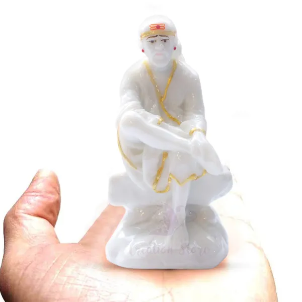 Sai_Baba_Statue_Marble_Dust_Murti_For_Home_Pooja_Car_Dashboard_Sai_Baba_Idol_Handmade_Finishing_Sitting_On_Stone_4_Inch