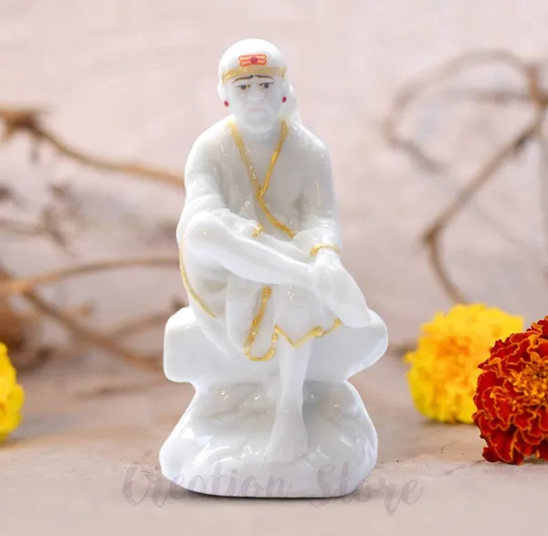 Sai_Baba_Statue_Marble_Dust_Murti_For_Home_Pooja_Car_Dashboard_Sai_Baba_Idol_Handmade_Finishing_Sitting_On_Stone_4_Inch
