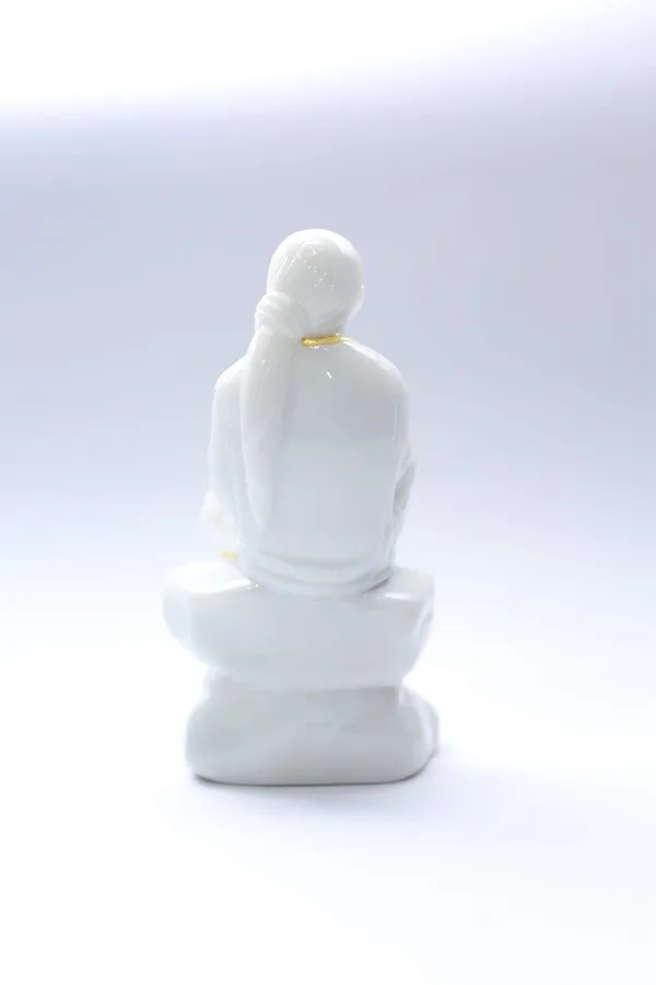 Sai_Baba_Statue_Marble_Dust_Murti_For_Home_Pooja_Car_Dashboard_Sai_Baba_Idol_Handmade_Finishing_Sitting_On_Stone_4_Inch