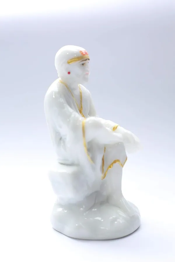 Sai_Baba_Statue_Marble_Dust_Murti_For_Home_Pooja_Car_Dashboard_Sai_Baba_Idol_Handmade_Finishing_Sitting_On_Stone_4_Inch