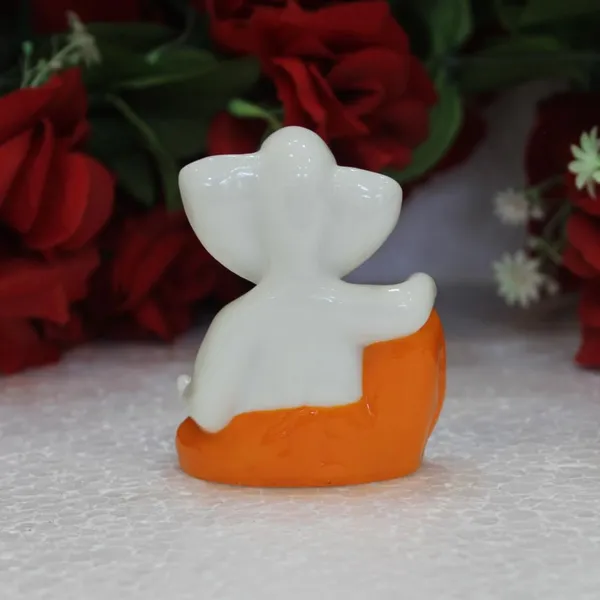Tilak_Ganesh_Idol_For_Car_Dashboard_Small_Marble_Idol_God_Ganesha_Statue_Murti_Ganpati_Idol_Figurine_White_Orange