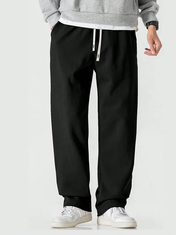 Black_Drawstring_Relaxed_Fit_Trousers_for_Men