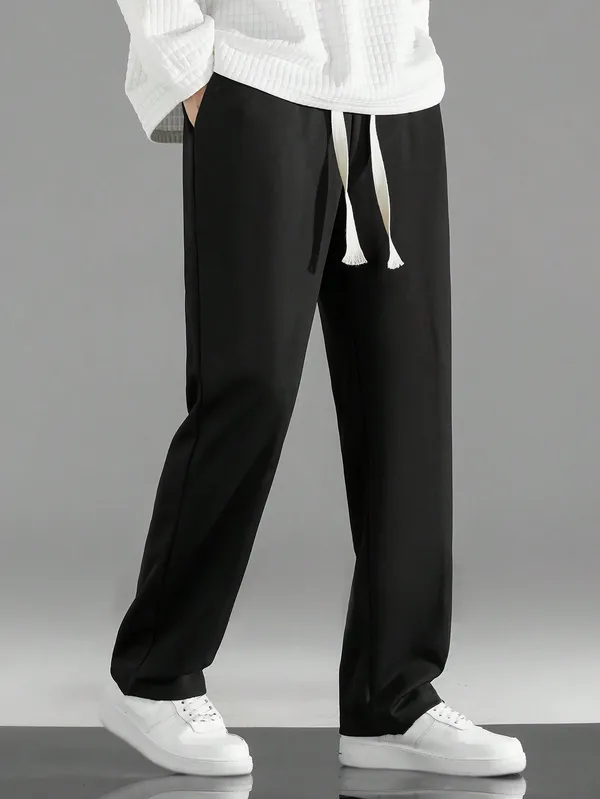 Black_Relaxed_Fit_Drawstring_Trousers_For_Men