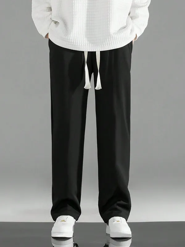 Black_Relaxed_Fit_Drawstring_Trousers_For_Men