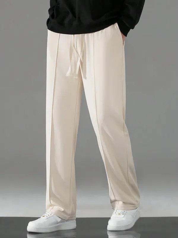 Cream_Relaxed_Fit_Drawstring_Trousers_For_Men