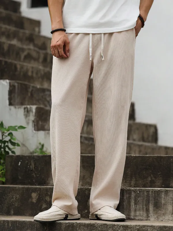 Beige_Textured_Relaxed_Fit_Trousers_For_Men