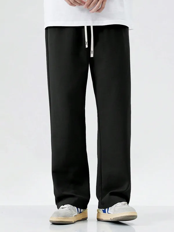 Black_Drawstring_Relaxed_Fit_Trousers_for_Men