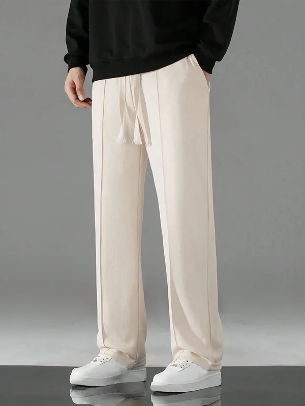 Cream_Relaxed_Fit_Drawstring_Trousers_For_Men