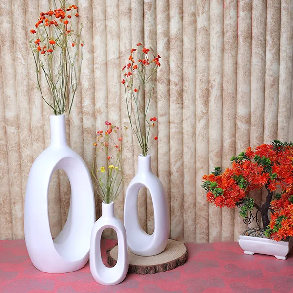 Oval_Shaped_Flower_Vases_For_Home_Decor_White_Polyresin_9_5_Inch