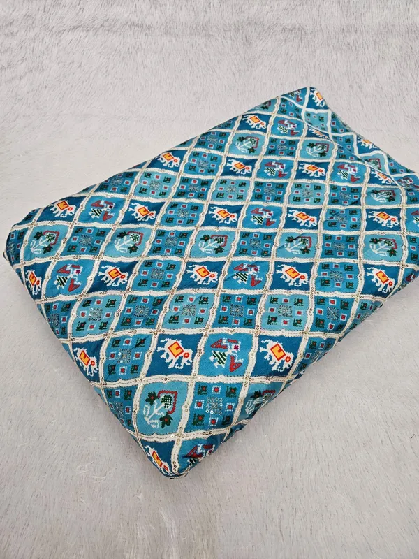 Blue_Patola_Position_Print_On_D_Crepe_Fabric