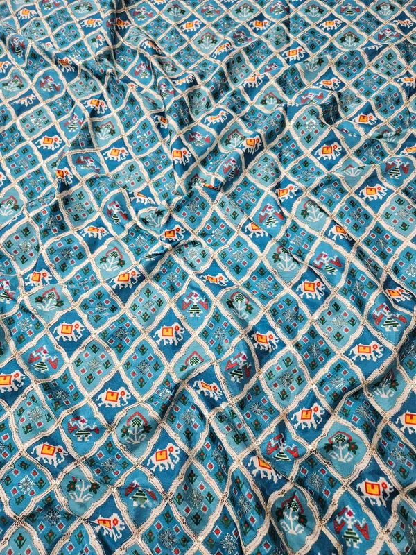 Blue_Patola_Position_Print_On_D_Crepe_Fabric