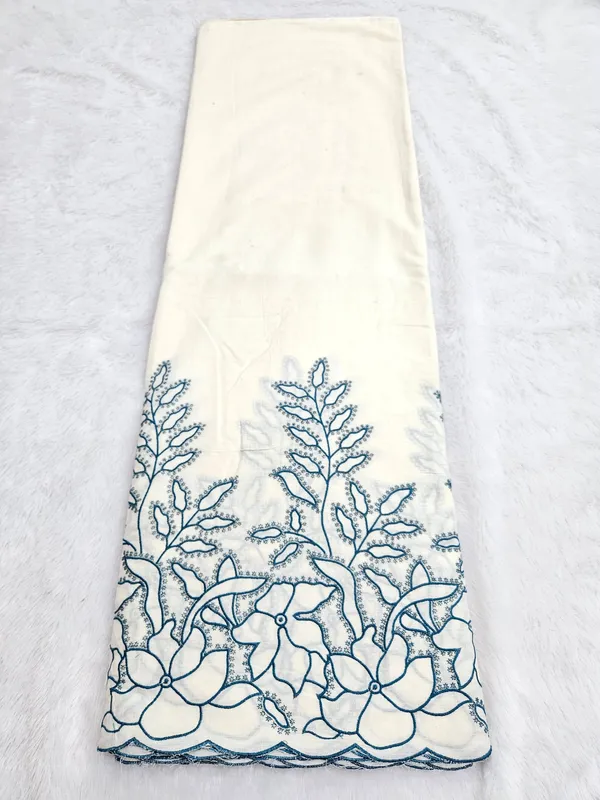Teal_Blue_Thread_Embroidery_On_Kora_Mul_Cotton_Fabric