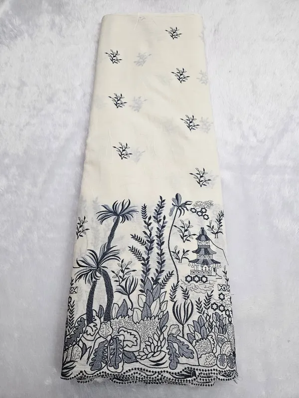 Floral_Coloured_Thread_Embroidery_On_Kora_Mul_Cotton_Fabric
