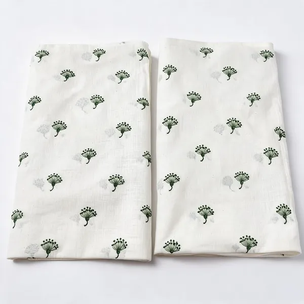 Green_Thread_Butta_Embroidery_On_Dyeable_Kora_Cotton_Fabric