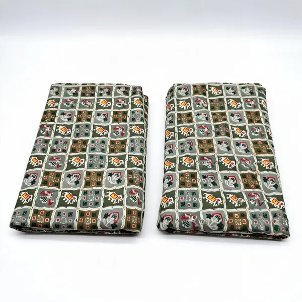 Green_Patola_Position_Print_On_D_Crepe_Fabric