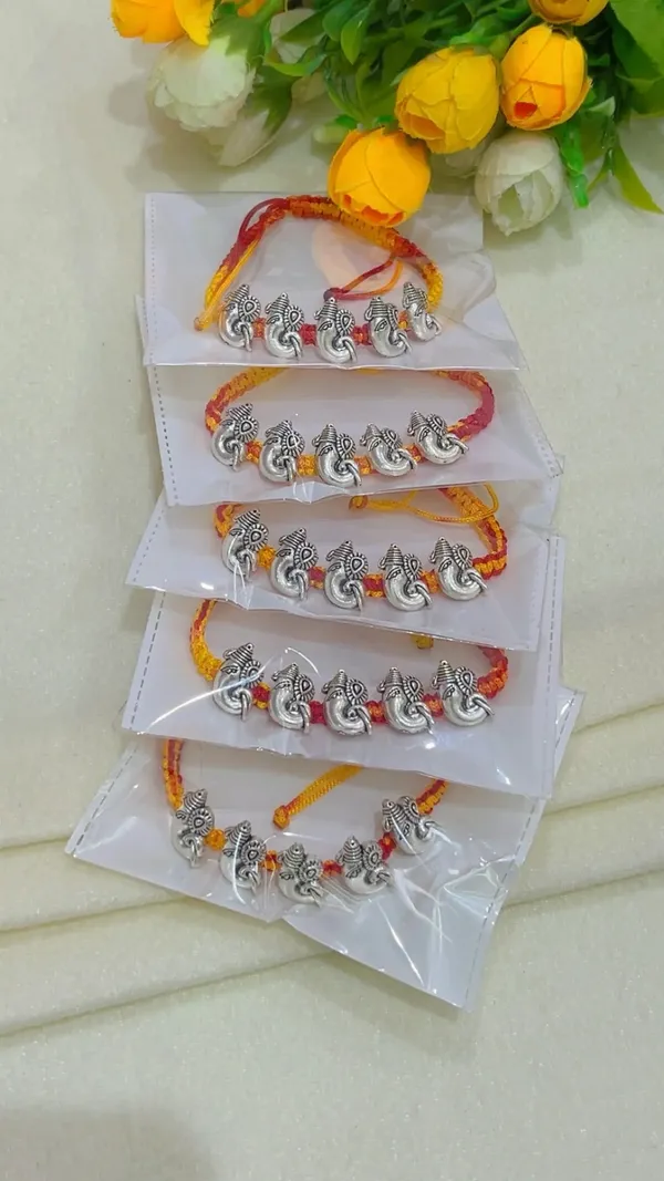 Red_Yellow_Thread_Elephant_Charm_Rakhi_Set_for_Brothers