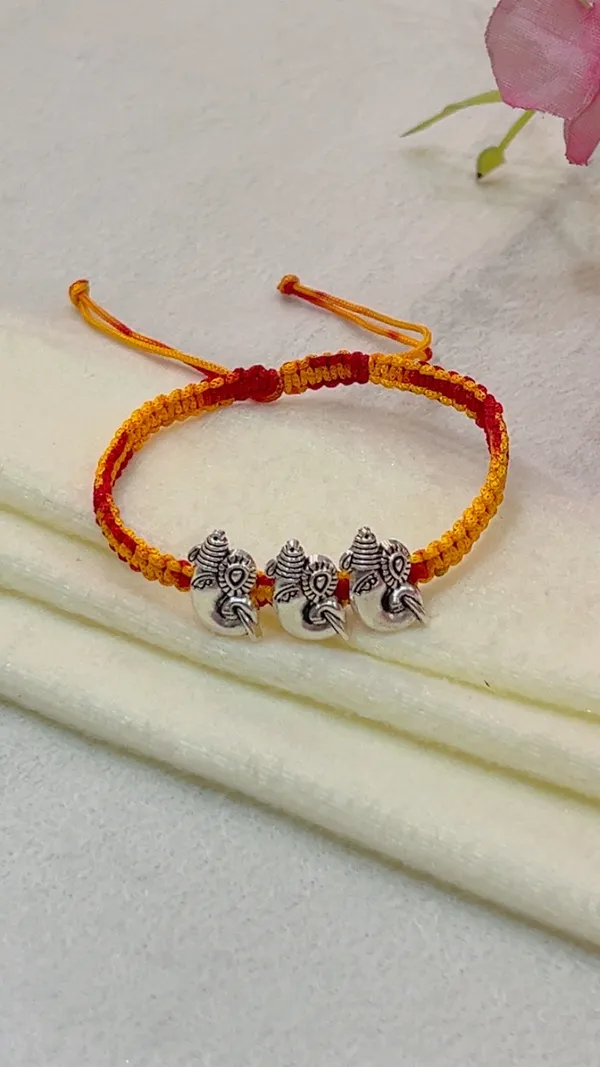 Red_Yellow_Thread_Elephant_Charm_Bracelet_for_Women_-_Pack_of_2
