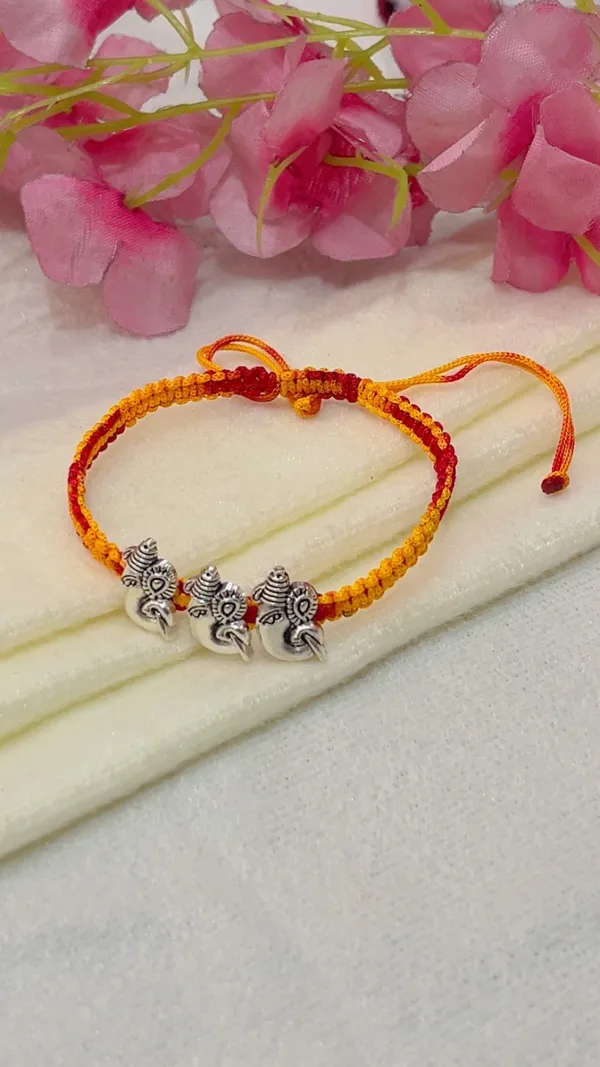 Red_Yellow_Thread_Elephant_Charm_Bracelet_for_Women_-_Pack_of_2